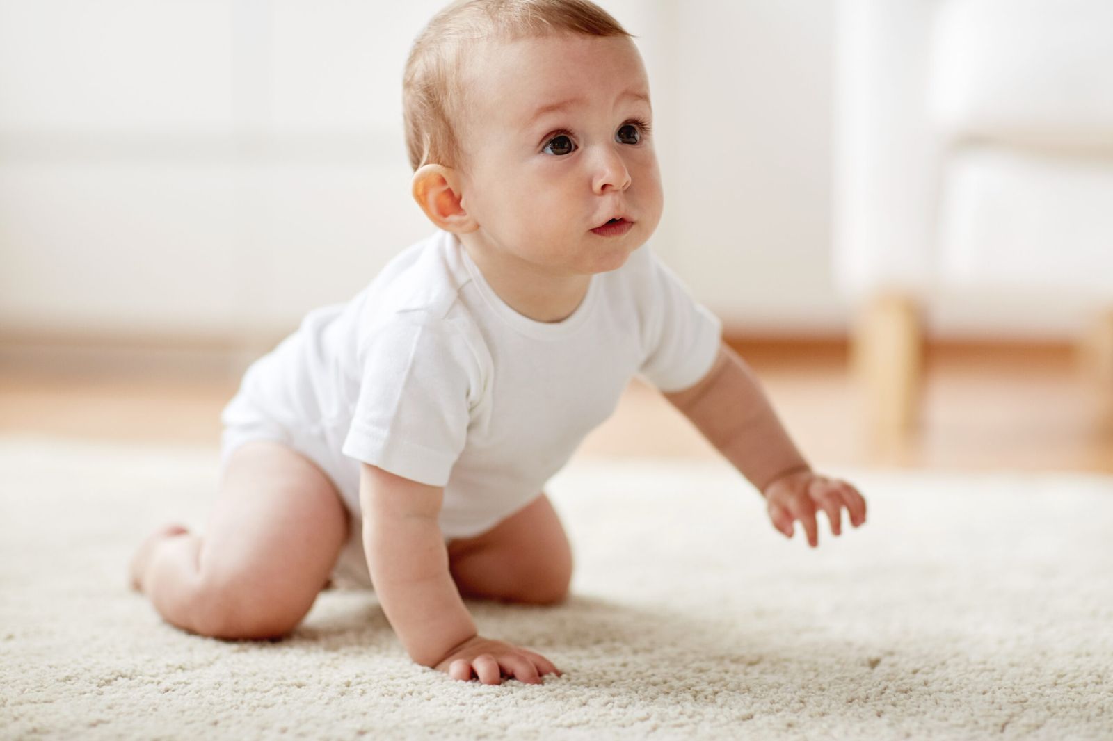 Baby crawling at home